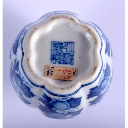 1142 - A LOVELY 19TH CENTURY CHINESE BLUE AND WHITE PORCELAIN VASE bearing Qianlong marks to base, of melon... 