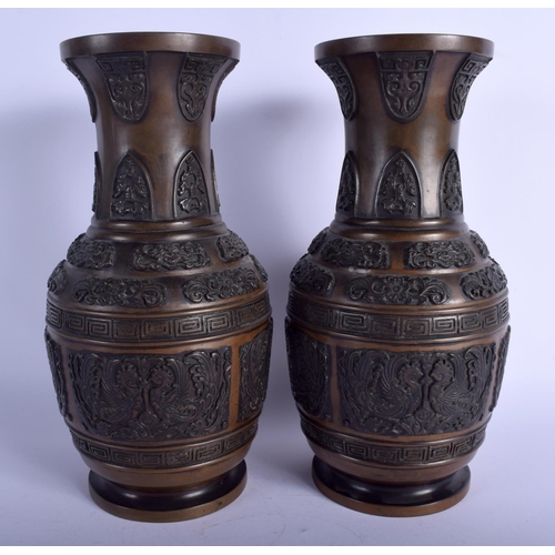 1159 - A LARGE PAIR OF 19TH CENTURY JAPANESE MEIJI PERIOD BRONZE VASES decorated with foliage and birds. 30... 