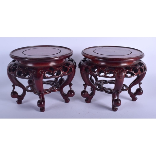 1204 - A PAIR OF EARLY 20TH CENTURY CHINESE HARDWOOD STANDS Late Qing/Republic. 20 cm x 17 cm.