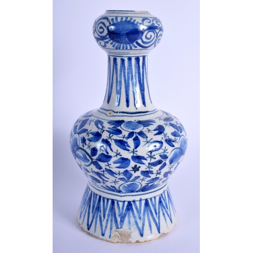 123 - AN 18TH CENTURY DELFT BLUE AND WHITE FAIENCE GLAZED VASE painted with foliage. 18 cm high.