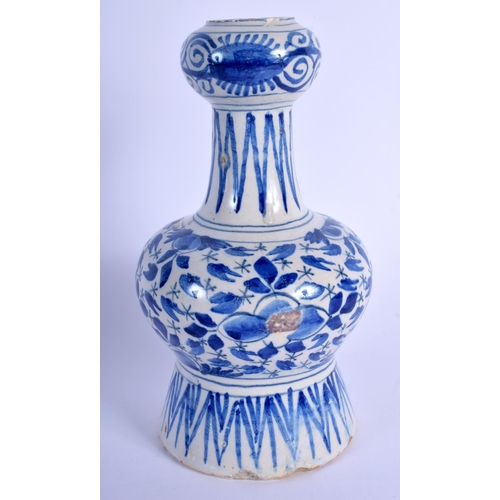 123 - AN 18TH CENTURY DELFT BLUE AND WHITE FAIENCE GLAZED VASE painted with foliage. 18 cm high.