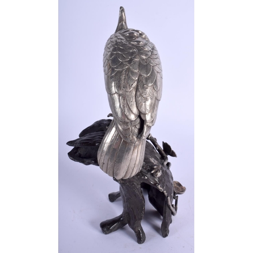 1231 - A 19TH CENTURY JAPANESE MEIJI PERIOD SILVERED OKIMONO OF A BIRD modelled upon an alloy base. 22 cm h... 