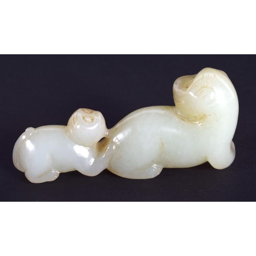 1240 - A CHINESE CARVED GREENISH WHITE JADE FIGURE 20th Century, modelled as two beasts. 6 cm wide.