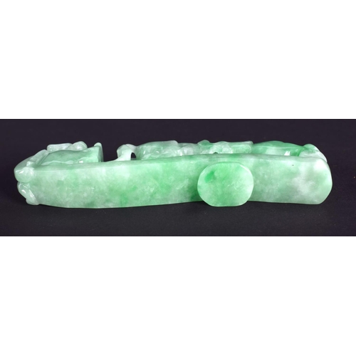 1269 - AN EARLY 20TH CENTURY CHINESE CARVED GREEN JADEITE BELT HOOK Late Qing/Republic. 7 cm wide.