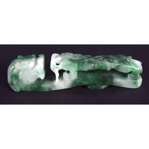 1296 - A CHINESE CARVED GREEN JADEITE BELT HOOK 20th Century. 6.5 cm long.