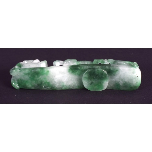 1296 - A CHINESE CARVED GREEN JADEITE BELT HOOK 20th Century. 6.5 cm long.