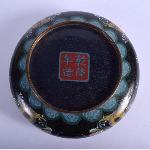 1307 - A LARGE EARLY 20TH CENTURY CHINESE CLOISONNE ENAMEL BOWL decorated with dragons. 23 cm diameter.