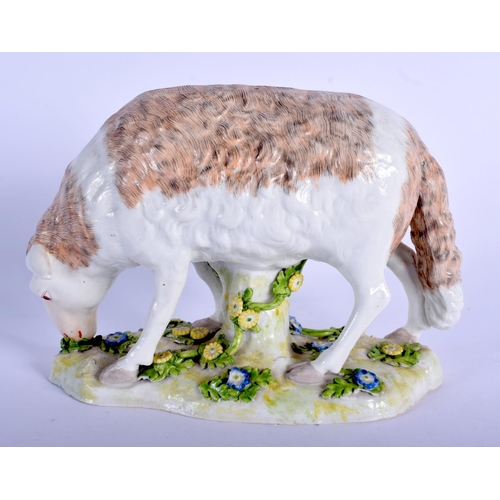 131 - A 19TH CENTURY CONTINENTAL PORCELAIN MODEL OF A SHEEP modelled upon flower encrusted bases. 18 cm x ... 