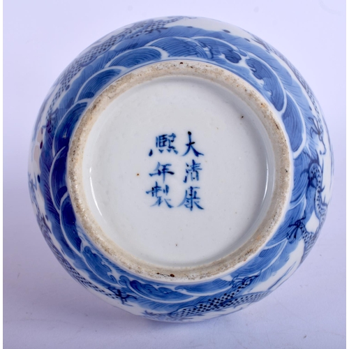 1323 - A 19TH CENTURY CHINESE BLUE AND WHITE PORCELAIN VASE bearing Kangxi marks to base. 21 cm high.