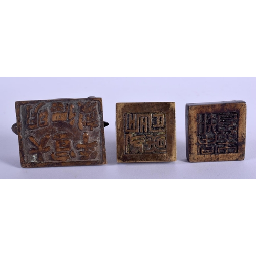 1337 - THREE 19TH CENTURY CHINESE BRONZE SEALS Qing. Largest 5 cm x 3 cm. (3)