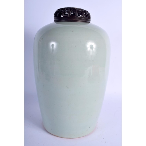 1339 - A 19TH CENTURY CHINESE BLUE AND WHITE CELADON VASE AND COVER Qing. 33 cm high.