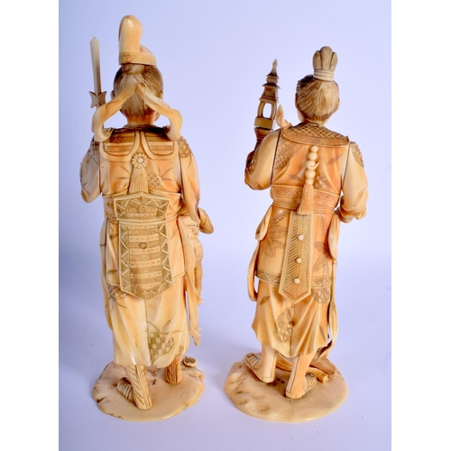 1377 - A PAIR OF 19TH CENTURY JAPANESE MEIJI PERIOD CARVED IVORY OKIMONO modelled holding temples & an oni.... 