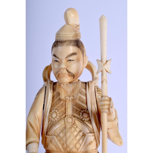 1377 - A PAIR OF 19TH CENTURY JAPANESE MEIJI PERIOD CARVED IVORY OKIMONO modelled holding temples & an oni.... 