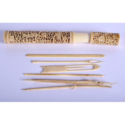 1380 - A 19TH CENTURY CHINESE CANTON IVORY NEEDLE CASE Qing, decorated with figures. 16.5 cm long.