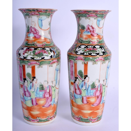 1387 - A PAIR OF 19TH CENTURY CHINESE CANTON FAMILLE ROSE VASES painted with figures. 21 cm high.