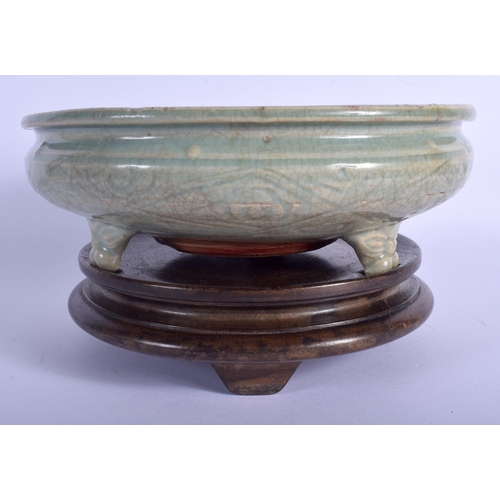 1398 - A LARGE 16TH/17TH CENTURY CHINESE CELADON INCISED CENSER Ming, decorated with foliage. 22 cm x 9 cm.