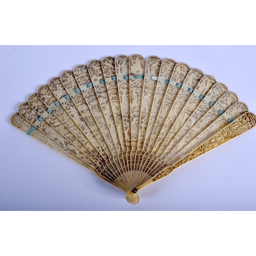 1400 - A MID 19TH CENTURY CHINESE CANTON CARVED IVORY FAN Qing, decorated with figures in various pursuits.... 