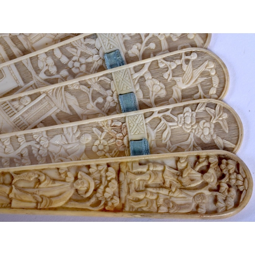 1400 - A MID 19TH CENTURY CHINESE CANTON CARVED IVORY FAN Qing, decorated with figures in various pursuits.... 