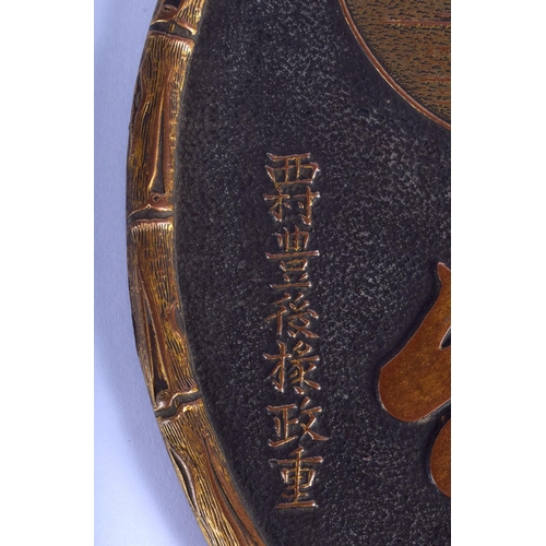 1402 - A 19TH CENTURY JAPANESE MEIJI PERIOD KOMAI TYPE CIRCULAR HAND MIRROR decorated with birds and landsc... 