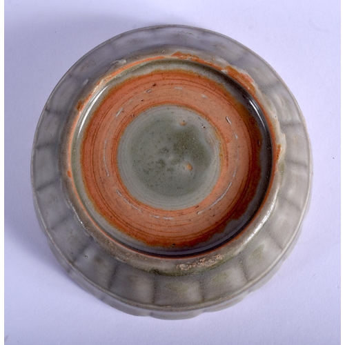 1403 - AN EARLY CHINESE YUAN/MING DYNASTY CELADON BRUSH WASHER of fluted form. 10 cm diameter.