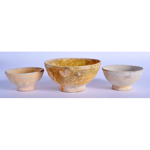 1410 - THREE 16TH/17TH CENTURY THAI SHIPWRECK POTTERY BOWLS. Largest 9 cm diameter. (3)