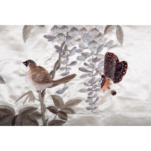 1411 - AN EARLY 20TH CENTURY JAPANESE MEIJI PERIOD SILKWORK EMBROIDERED PANEL decorated with a peacock, but... 