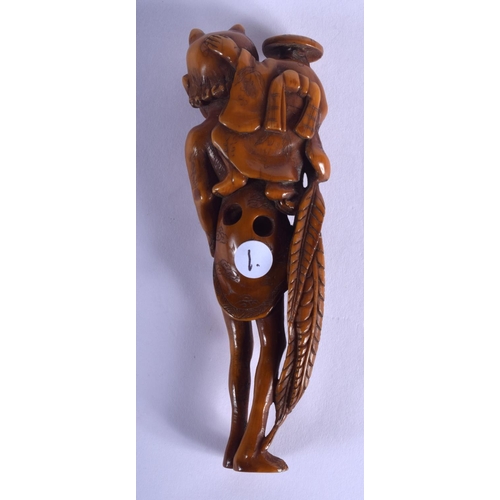 1415 - A LARGE 19TH CENTURY JAPANESE MEIJI PERIOD STAINED IVORY NETSUKE modelled as oni with a farmer upon ... 