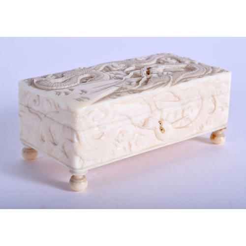 1421 - A 19TH CENTURY JAPANESE MEIJI PERIOD CARVED IVORY BOX decorated with Ryujin the dragon god of the se... 