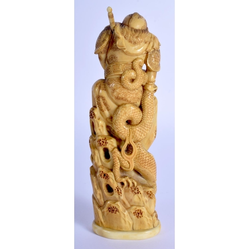 1422 - A 19TH CENTURY JAPANESE MEIJI PERIOD CARVED IVORY OKIMONO modelled as Agatamori fighting Mizuchi the... 