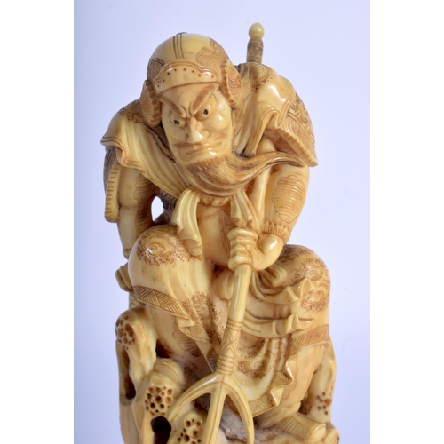 1422 - A 19TH CENTURY JAPANESE MEIJI PERIOD CARVED IVORY OKIMONO modelled as Agatamori fighting Mizuchi the... 