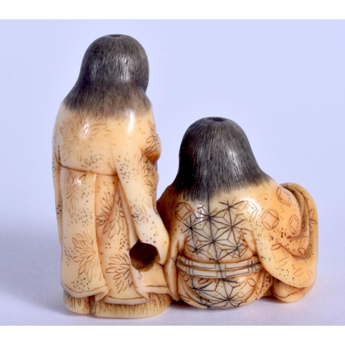 1424 - A 19TH CENTURY JAPANESE MEIJI PERIOD CARVED IVORY NETSUKE by Bunsho, modelled as Jittoku & Kanzeon. ... 