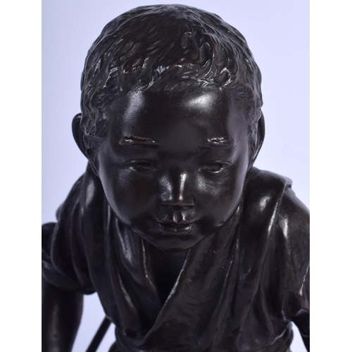 1428 - A 19TH CENTURY JAPANESE MEIJI PERIOD BRONZE OKIMONO by Maruki, modelled as a boy upon a rock. 41 cm ... 