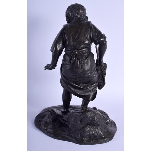 1428 - A 19TH CENTURY JAPANESE MEIJI PERIOD BRONZE OKIMONO by Maruki, modelled as a boy upon a rock. 41 cm ... 