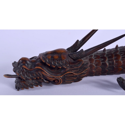 1436 - A FINE 19TH CENTURY JAPANESE MEIJI PERIOD CARVED BOXWOOD OKIMONO modelled as an articulated slender ... 