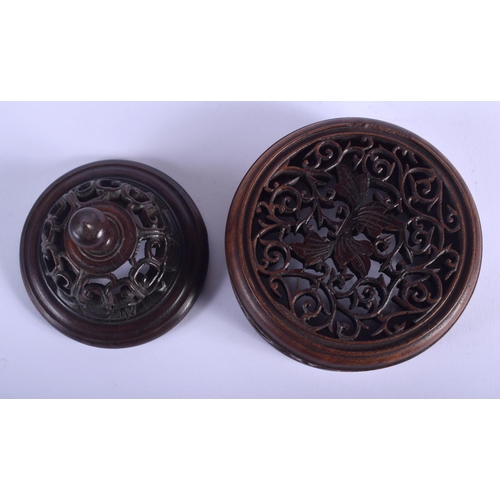 1440 - TWO 19TH CENTURY JAPANESE MEIJI PERIOD CARVED HARDWOOD COVERS Qing. 12 cm diameter.