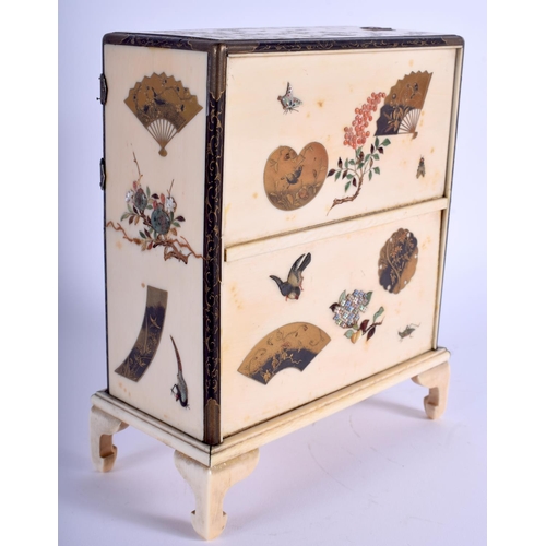 1454 - A 19TH CENTURY JAPANESE MEIJI PERIOD CARVED IVORY SHIBAYAMA CABINET decorated with foliage and vines... 