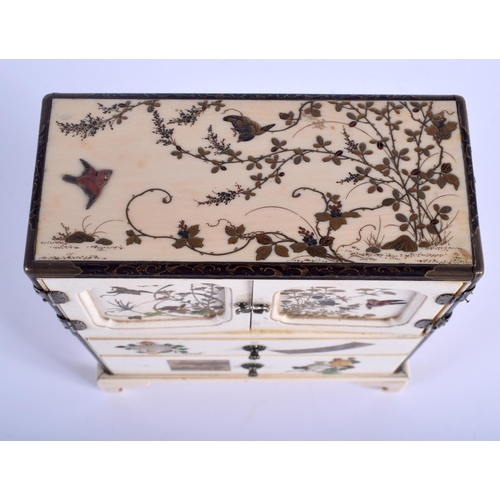 1454 - A 19TH CENTURY JAPANESE MEIJI PERIOD CARVED IVORY SHIBAYAMA CABINET decorated with foliage and vines... 