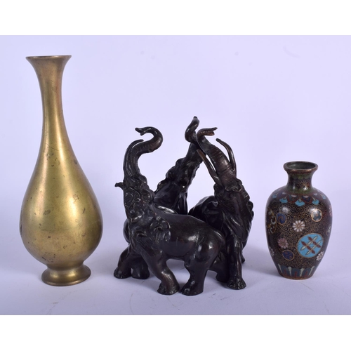 1461 - A 19TH CENTURY JAPANESE MEIJI PERIOD BRONZE ELEPHANT together with a vase etc. Largest 15 cm high. (... 