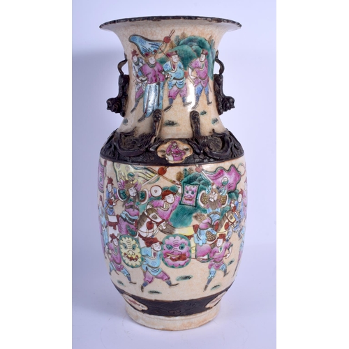 1485 - A LARGE 19TH CENTURY CHINESE FAMILLE ROSE CRACKLE GLAZED VASE Qing, painted with figures within land... 