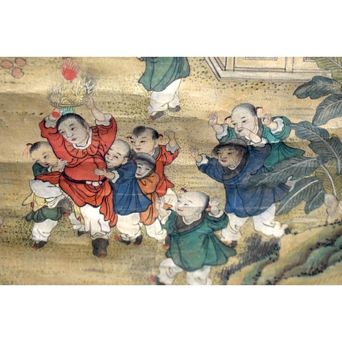 1507 - AN EARLY 20TH CENTURY CHINESE 100 BOYS SCROLL Late Qing, by Qiuying. Image 80 cm x 38 cm.