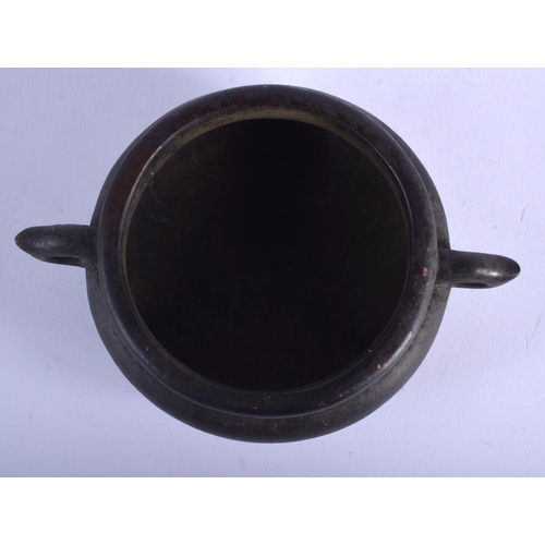 1538 - A CHINESE TWIN HANDLED BRONZE CENSER 20th century. 12.5 cm wide, internal width 7 cm.