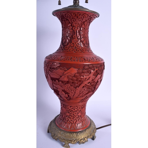 1540 - A LARGE 19TH CENTURY CHINESE CARVED CINNABAR LACQUER VASE converted to a lamp. Cinnabar 31 cm high.