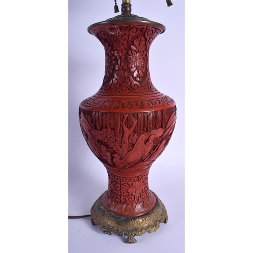 1540 - A LARGE 19TH CENTURY CHINESE CARVED CINNABAR LACQUER VASE converted to a lamp. Cinnabar 31 cm high.