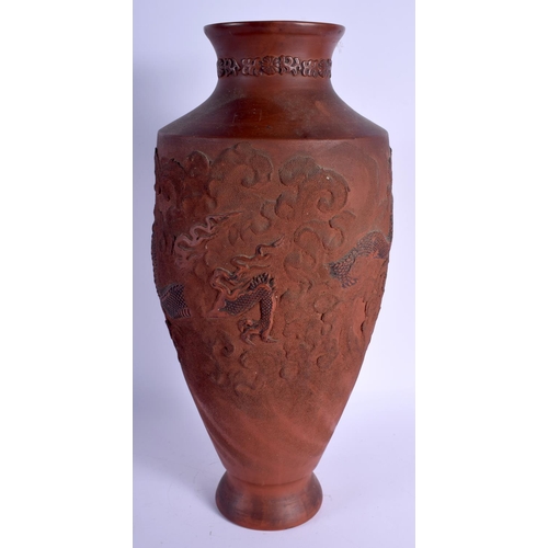 1544 - A LARGE 19TH CENTURY JAPANESE MEIJI PERIOD REDWARE TERRACOTTA VASE decorated with dragons. 45 cm hig... 