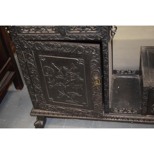 1567 - A LARGE 19TH CENTURY CHINESE CARVED HONGMU DISPLAY CABINET Qing, with profusely decoration frieze. 1... 