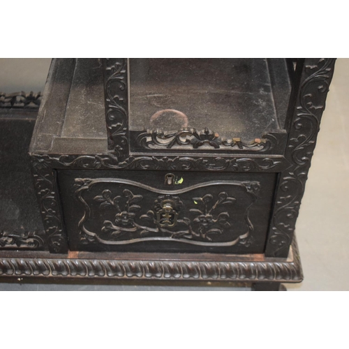 1567 - A LARGE 19TH CENTURY CHINESE CARVED HONGMU DISPLAY CABINET Qing, with profusely decoration frieze. 1... 