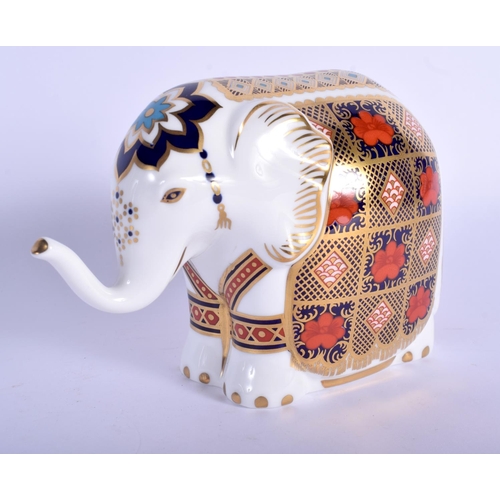 161 - A ROYAL CROWN DERBY ELEPHANT PAPERWEIGHT. 16 cm x 11 cm.