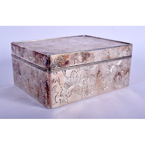 1633 - A 19TH CENTURY JAPANESE MEIJI PERIOD SILVER BOX AND COVER decorated with flowering vines. 681 grams.... 