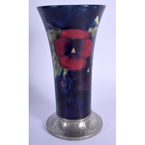 169 - A LIBERTY TUDRIC MOORCROFT FLOWER VASE. 17.5 cm high.