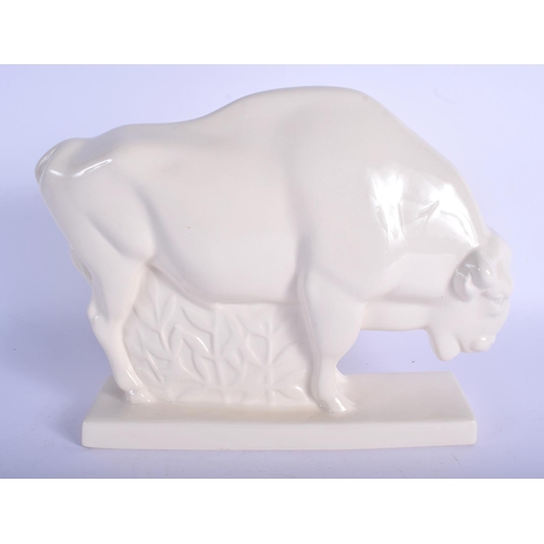 172 - A STYLISH WHITE GLAZED WEDGWOOD FIGURE OF A STYLISED BISON. 28 cm x 22 cm.